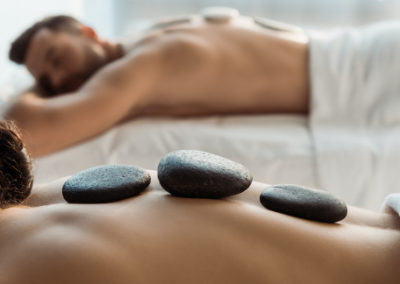Basalt stones on the spine of clients during a relaxing massage