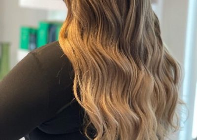 Brunette with graduated blonde hair at her tips